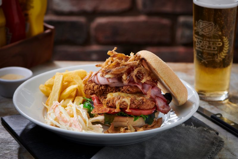 big chicken burger with chips and coleslaw