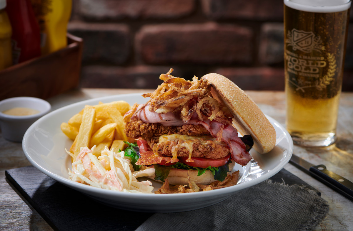 big chicken burger with chips and coleslaw