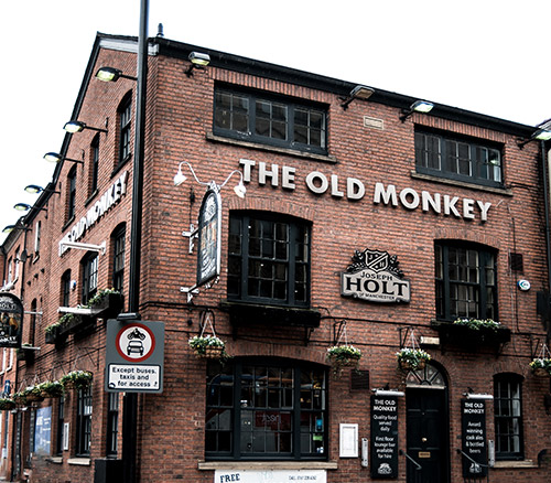 the old monkey pub in manchester corner of portland street