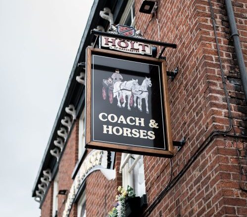 coach and horses pub sign