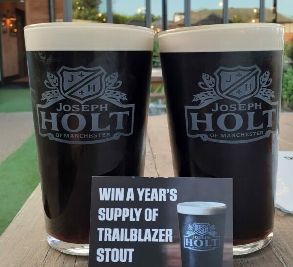 two pints trailblazer stout at the pub