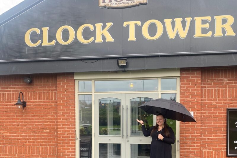 Our youngest landlady stood outside the Clock Tower pub